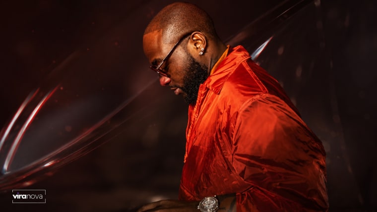 Editorial visual representing Davido’s “I Know Who I Be” as a Pan-African collaboration shaped by South African 3-Step production, featuring a studio console, glowing three-kick rhythm waveforms, Nigerian and South African sonic cues, and premium Viranova purple-and-gold glass styling.