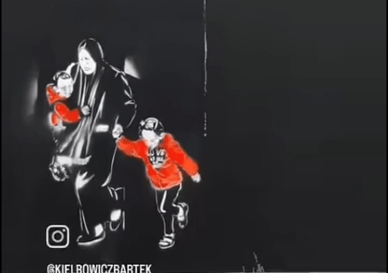 Mural. Love is all we need. Sólo precisamos amor. Por By BARTŁOMIEJ KIEŁBOWICZ ENGL ESP