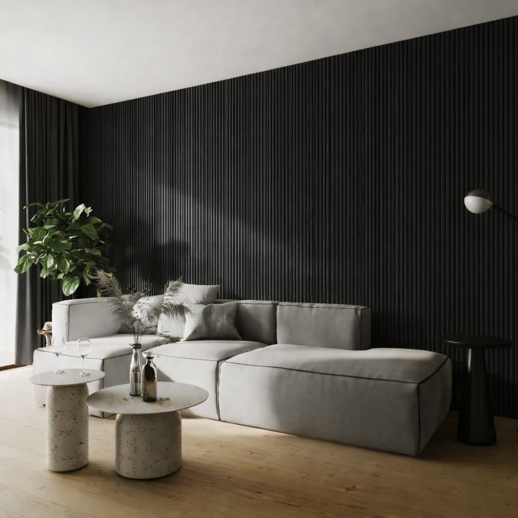 A minimalist interior featuring a tall vertical WPC radiator panel against a light-colored wall, alongside a green potted plant on a warm hardwood floor, evoking modern Scandinavian design and a sense of tranquility.