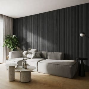 A minimalist interior featuring a tall vertical WPC radiator panel against a light-colored wall, alongside a green potted plant on a warm hardwood floor, evoking modern Scandinavian design and a sense of tranquility.
