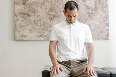 At-home neck exercise for spinal alignment and neck pain relief guided by chiropractic care at The Shift Chiropractic