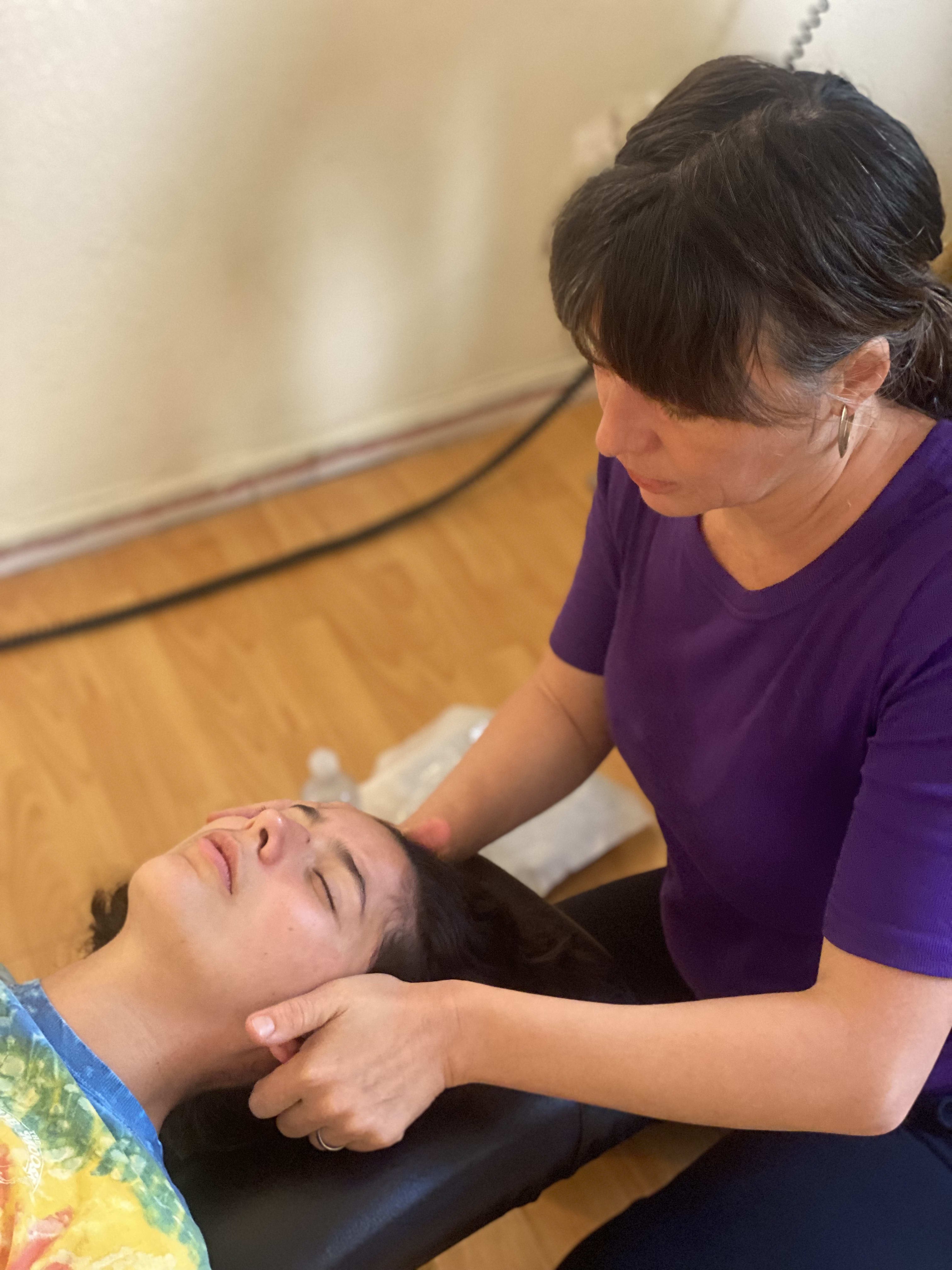 Chiropractor providing TMJ treatment for jaw pain relief at The Shift Chiropractic in Oakland