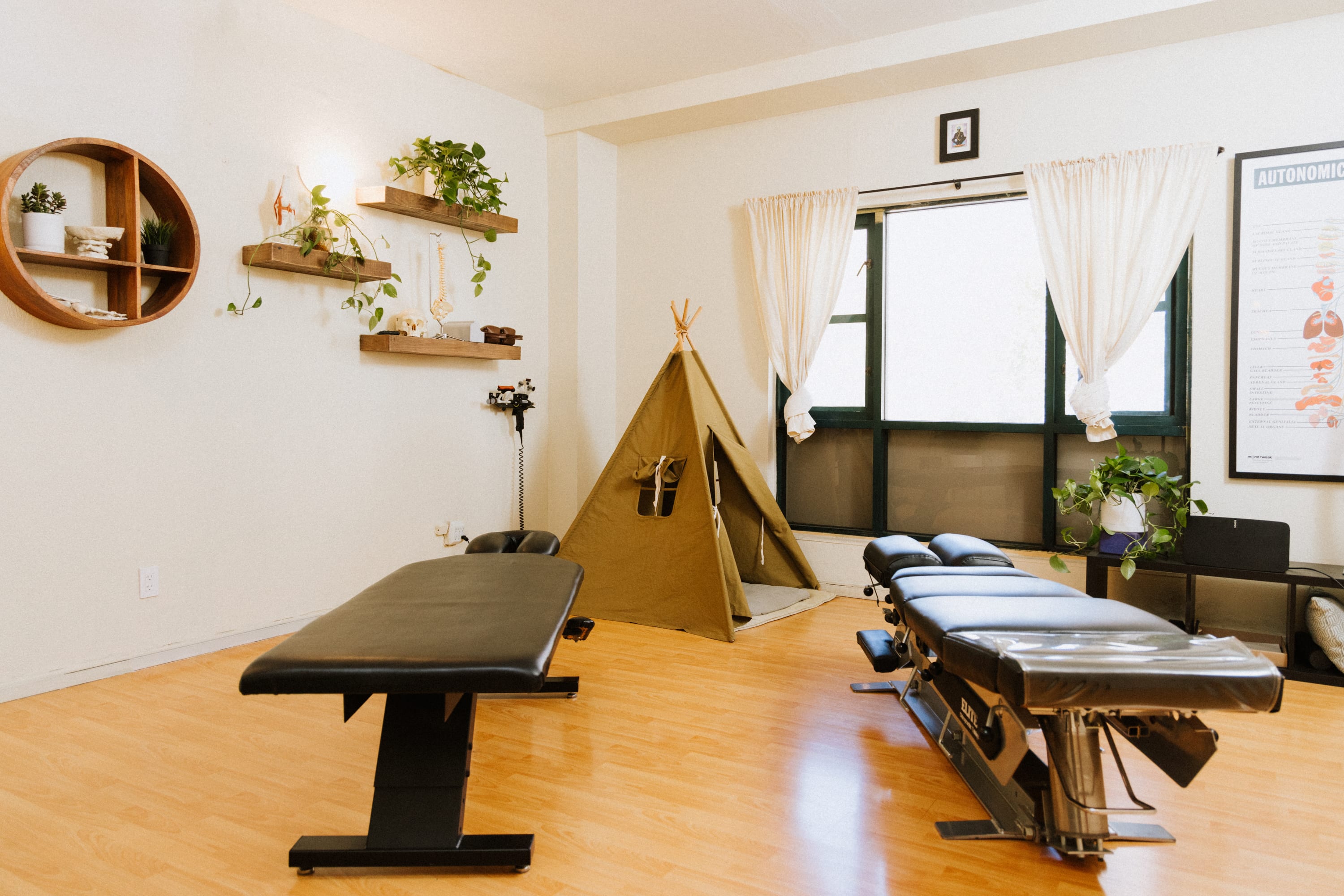 The Shift Chiropractic clinic interior in Oakland with treatment equipment and family-friendly space for chiropractic care