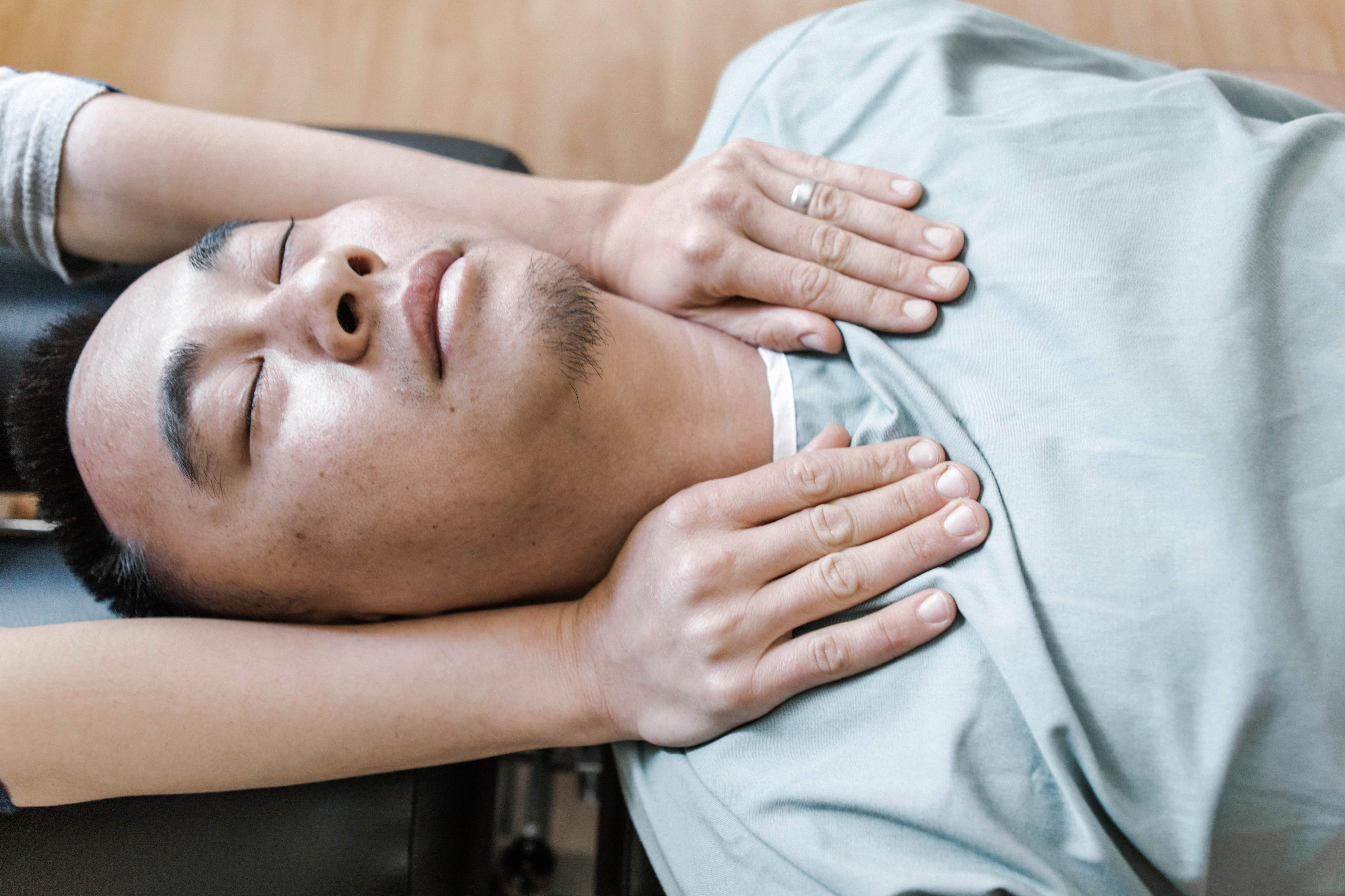 Manual chiropractic adjustment of neck and spine for pain relief at The Shift Chiropractic Oakland