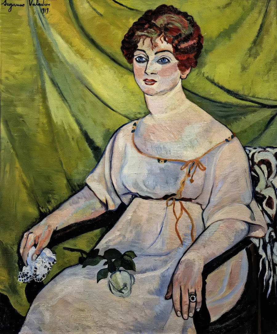 Femme dans un fauteuil (c. 1917) by Suzanne Valadon — a sitter in an armchair, oil on canvas.