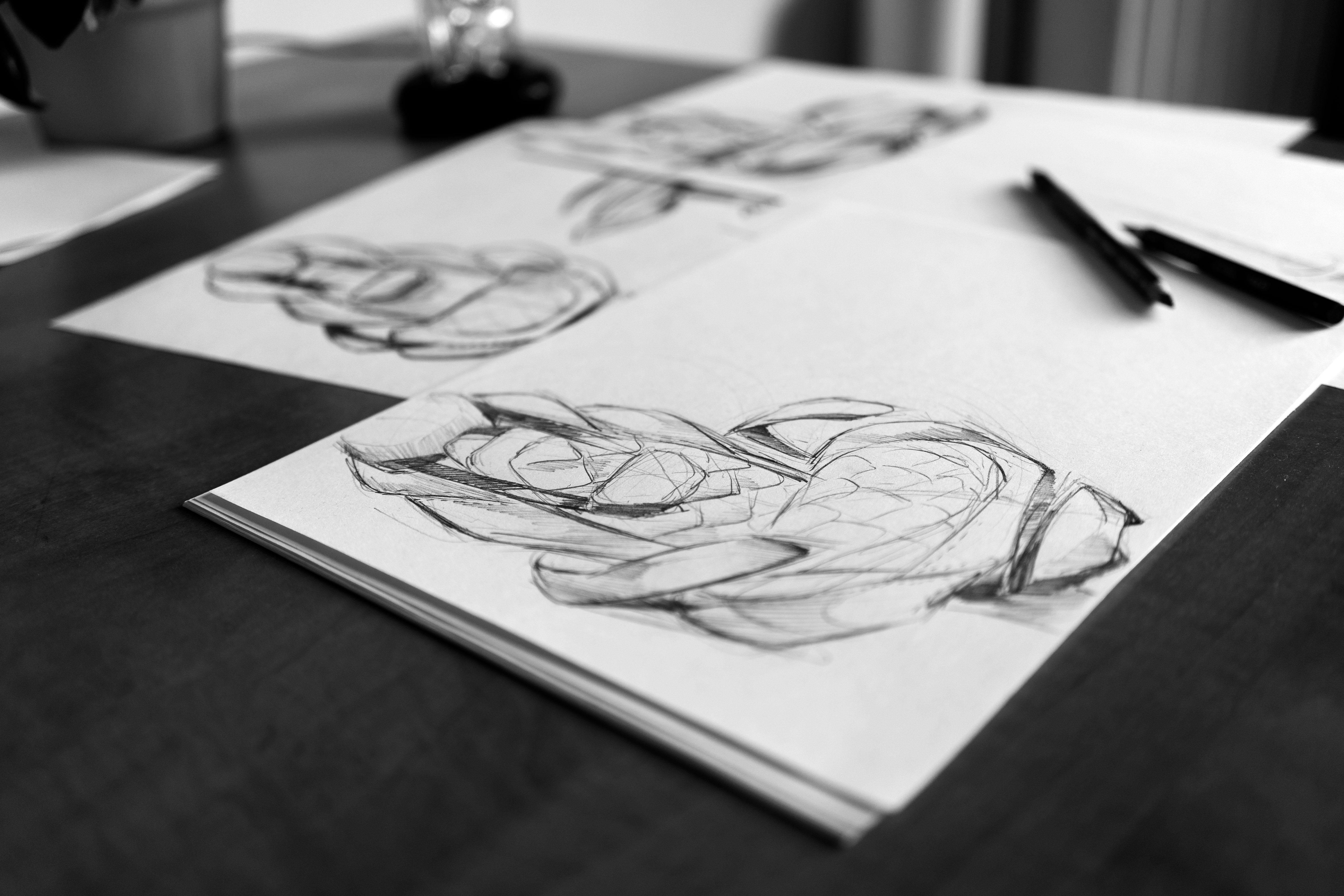Side-by-side comparison of a rough sketch and a finished graphical abstract built in a scientific design tool, illustrating the workflow from concept to polished figure