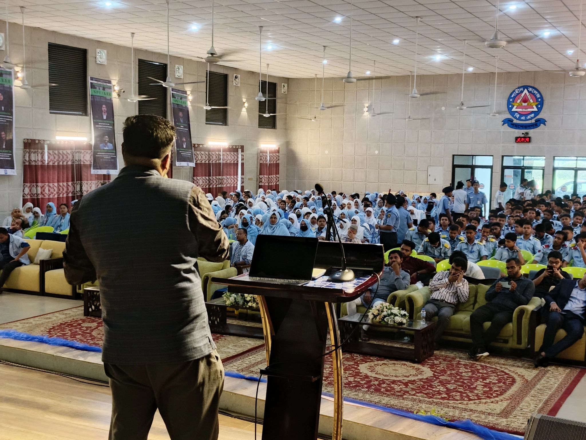 Sajjad giving a speech at an event