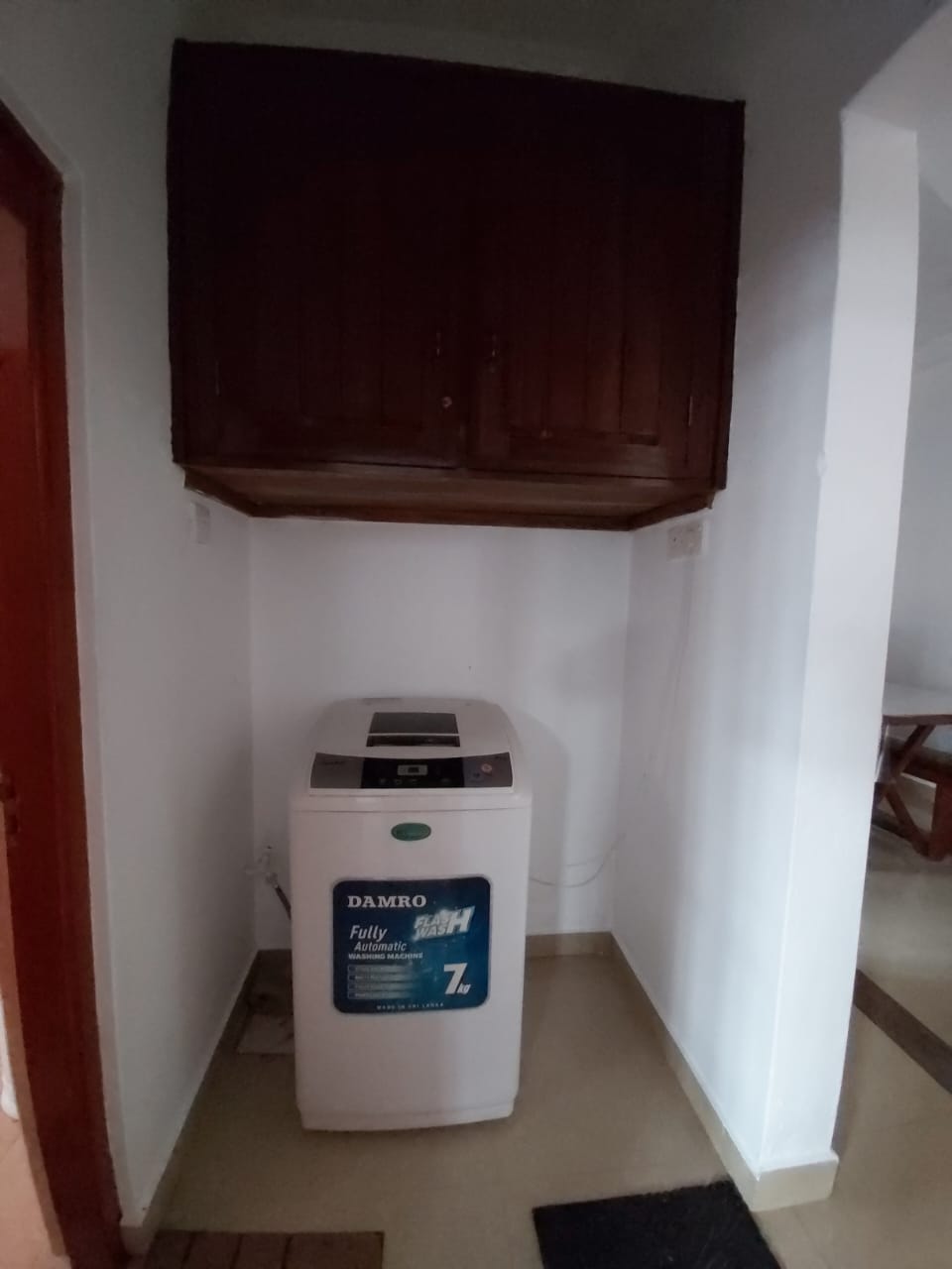 In-unit washing machine at long-stay housing near Karapitiya, Galle