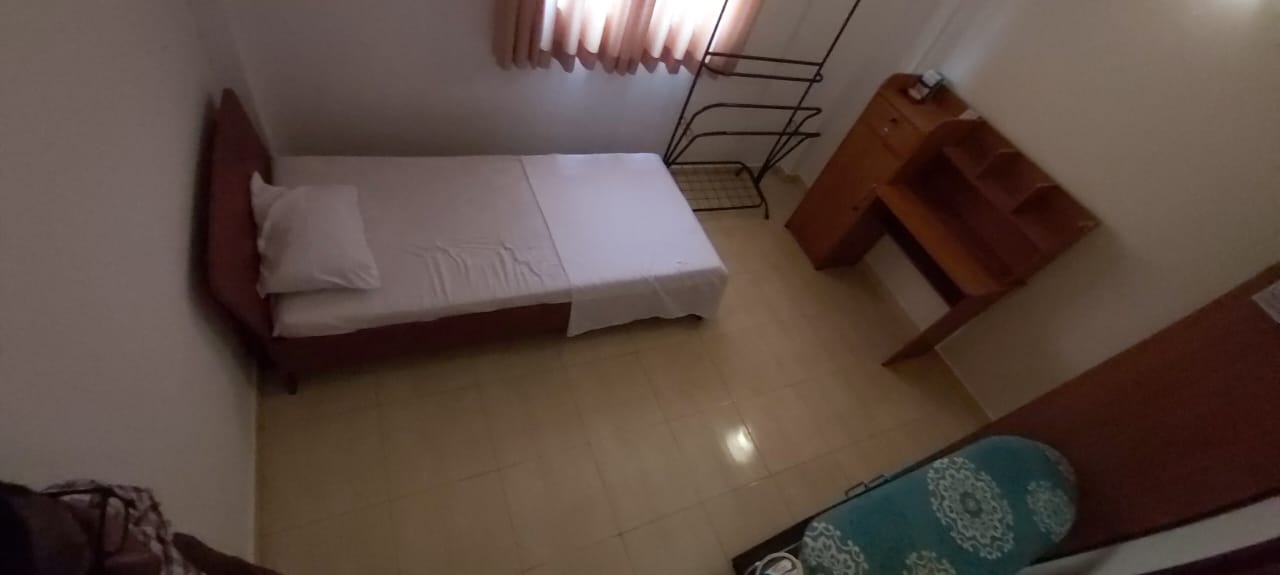 Cozy private bedroom with air conditioning and comfortable bedding at RnR Private Residence Galle