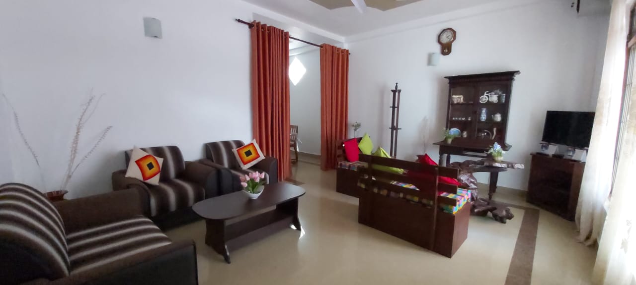 Rest area with TV at Karapitiya Home Stay Apartment