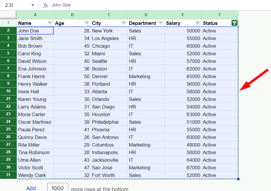 red arrow pointing to dotted blue border in google sheet