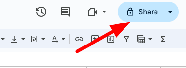 red arrow pointing to ‘Share’ button of a google sheet