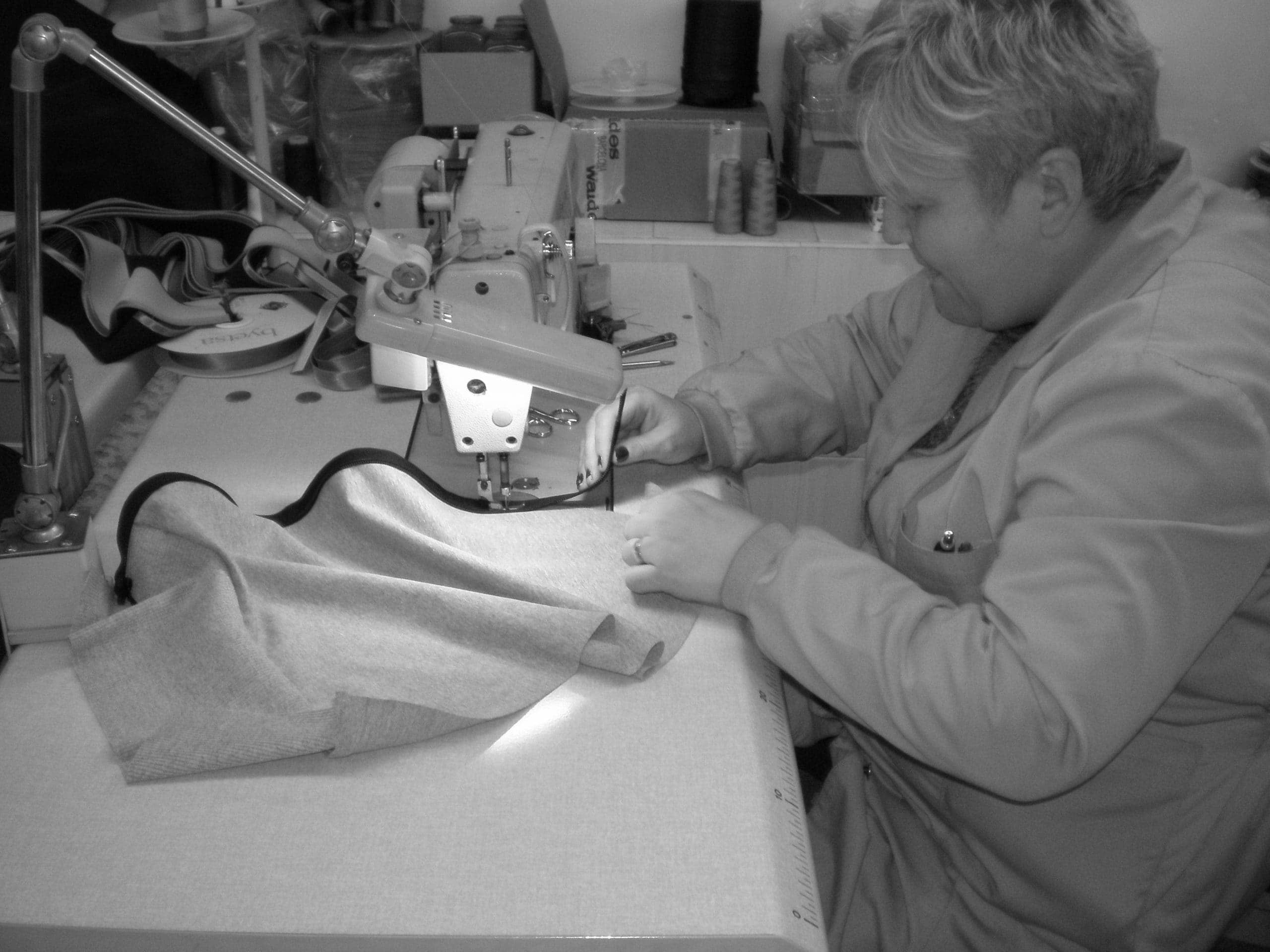 Inclusive fashion research. Image of Rosa sewing.