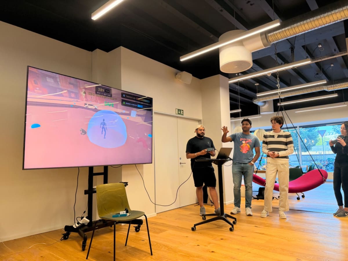 Creators demonstrating a Summer Engine game with an Arduino controller