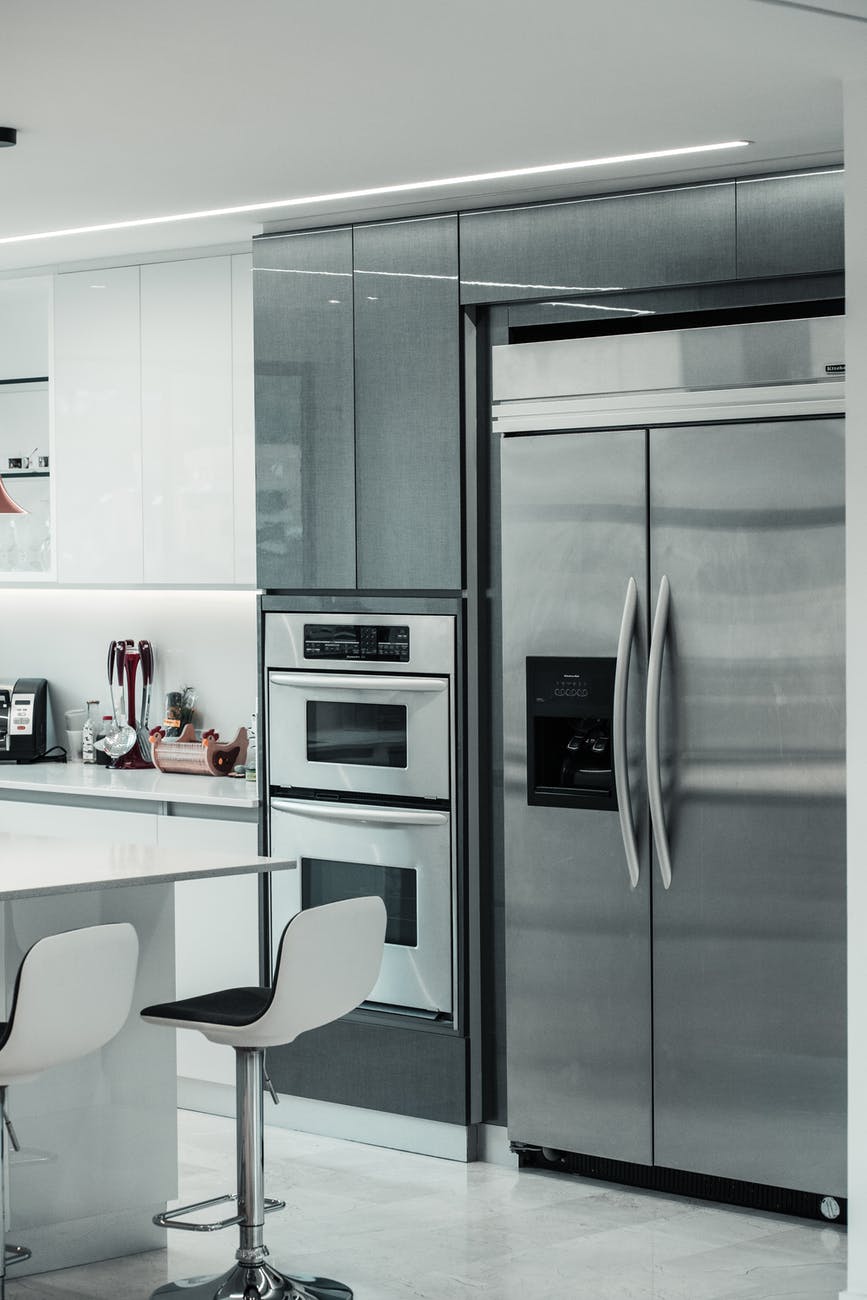 silver side by side refrigerator