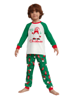 Den skäggige tomten begravd under sin gigantiska hatt, matchande familjepyjamas