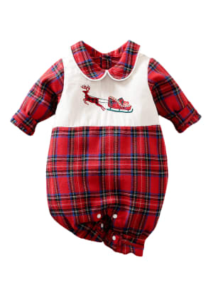 Vintage baby Christmas pajamas, embroidered with a flying reindeer and sleigh, red and white