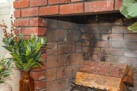 Dirty fireplace and chimney that we cleaned
