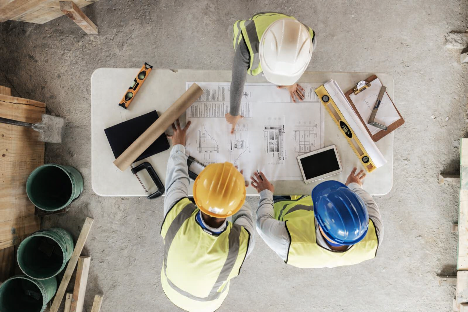 Construction website layout featuring workers and structured content sections