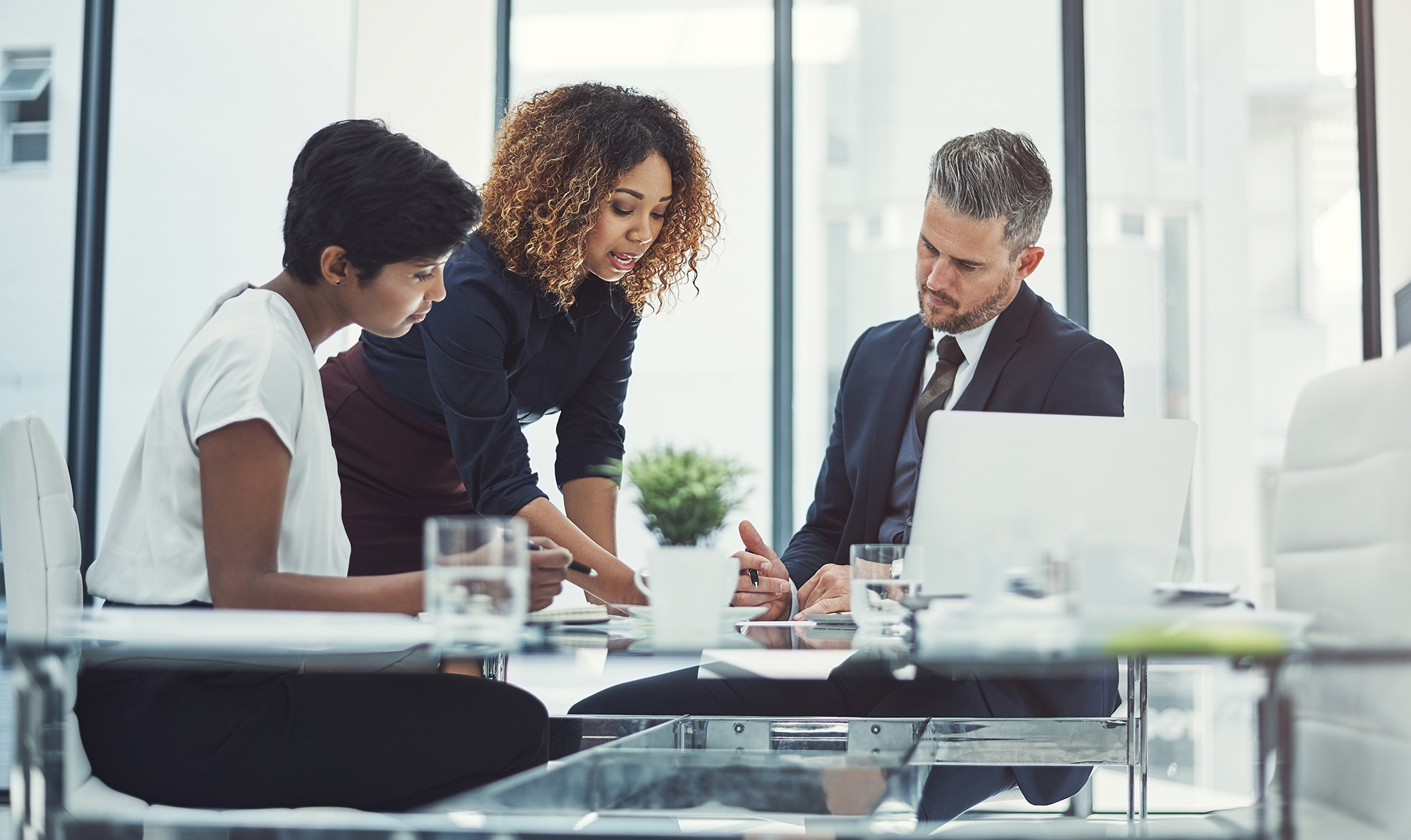Modern office interior with agents collaborating
