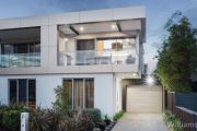 Interstate buyers beat 'bitterly disappointed' locals at auctions
