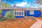 The prettiest street in Narrabundah: 1950s weatherboard cottage snapped up at auction