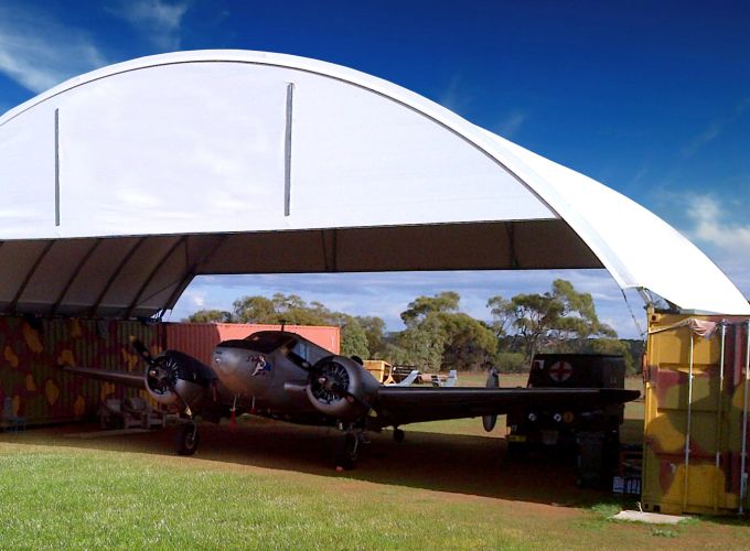 DomeShelter used to shelter a small plane.