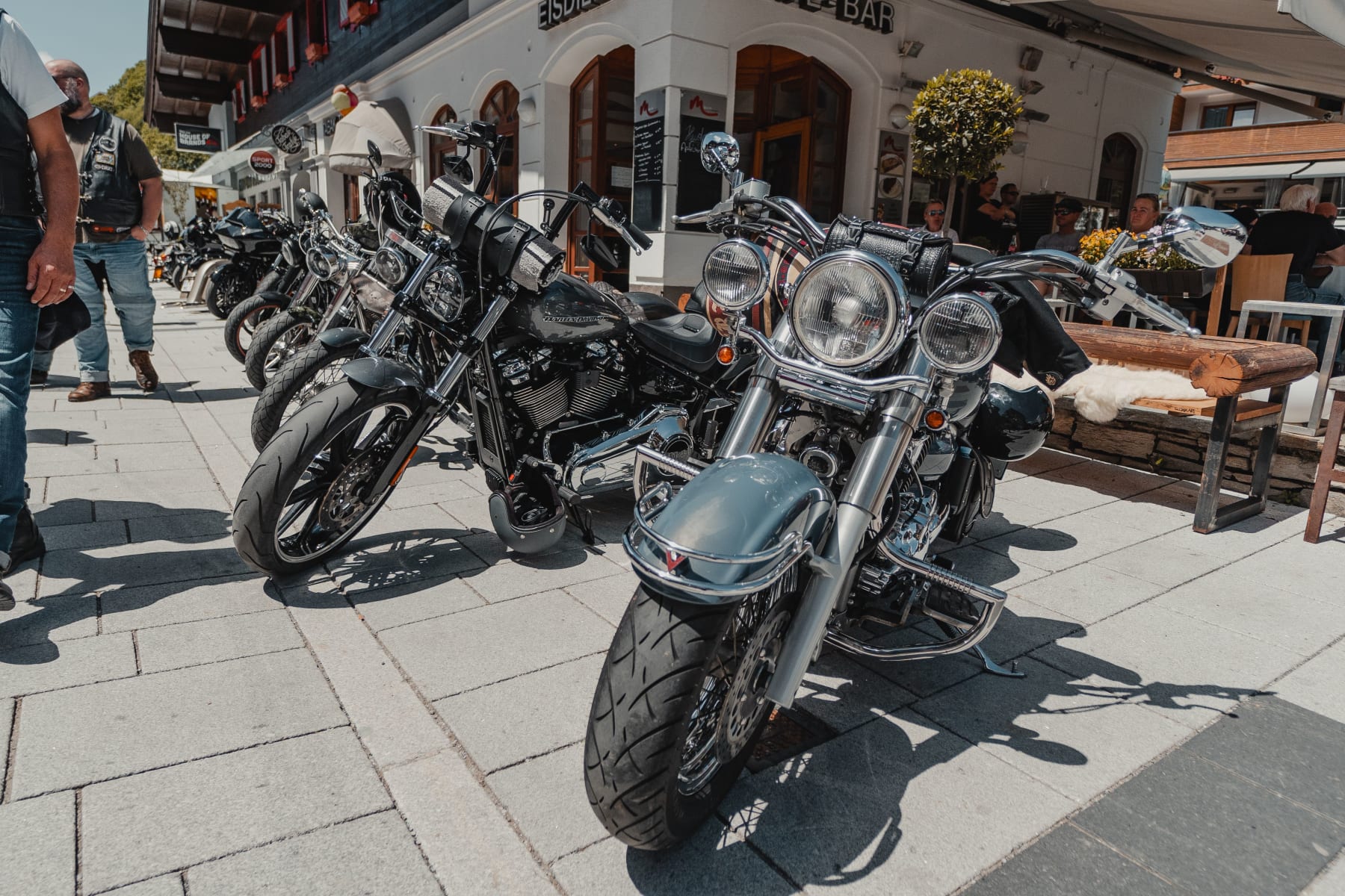 Motorcycles parked on Glemmtal street by Glemmtalerhof in Hinterglemm.