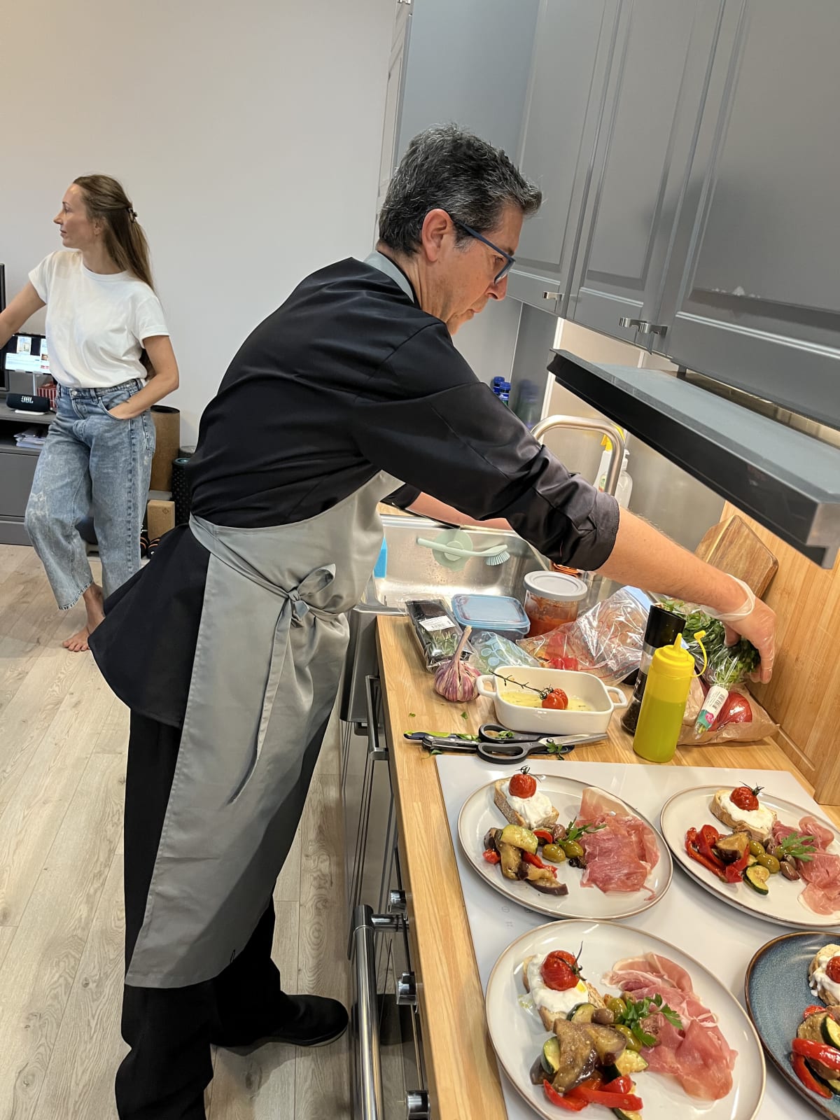 Chef Domenico Dell’Acqua cooking the first course in the family’s kitchen