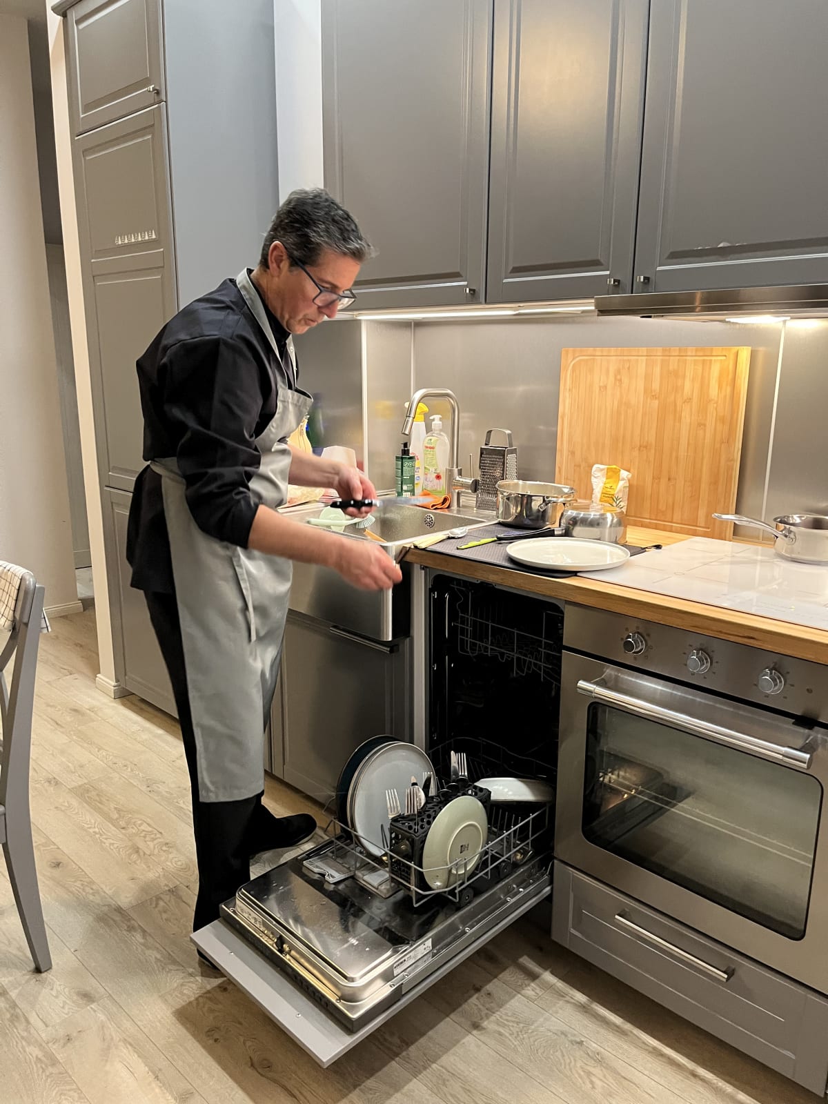 Kitchen cleanup in the family’s home after the dinner