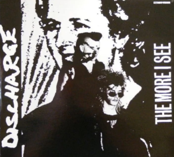 Discharge — The More I See — capa de referência editorial RockFuel