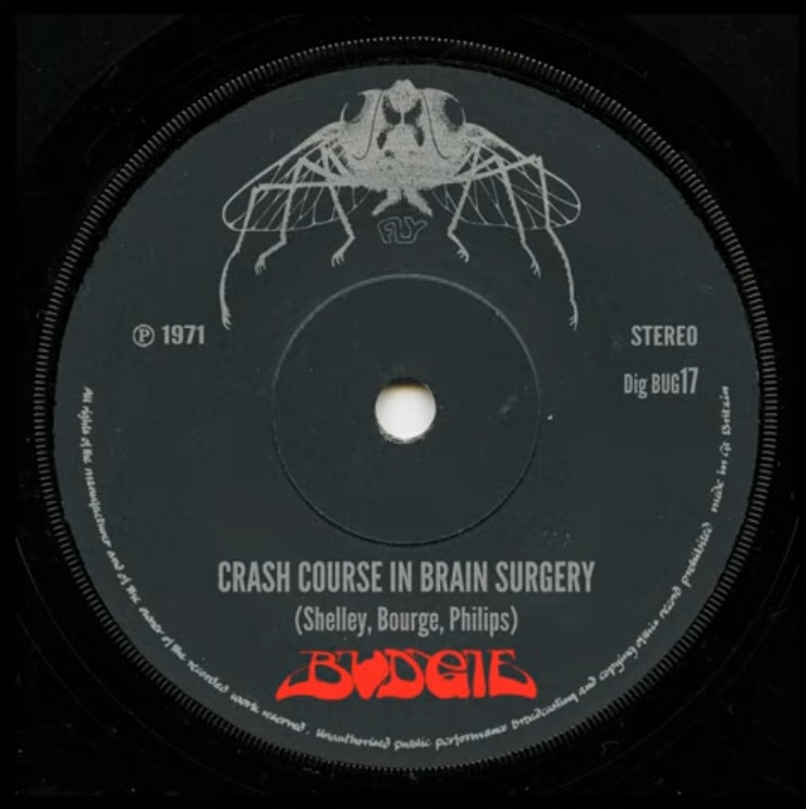 Budgie — Crash Course — capa de referência editorial RockFuel