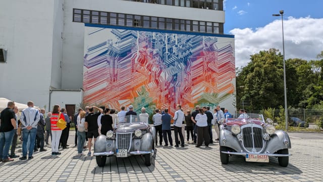 Mural by Polish artist Mariusz Waras on the walls of the Volkswagen plant in Chemnitz