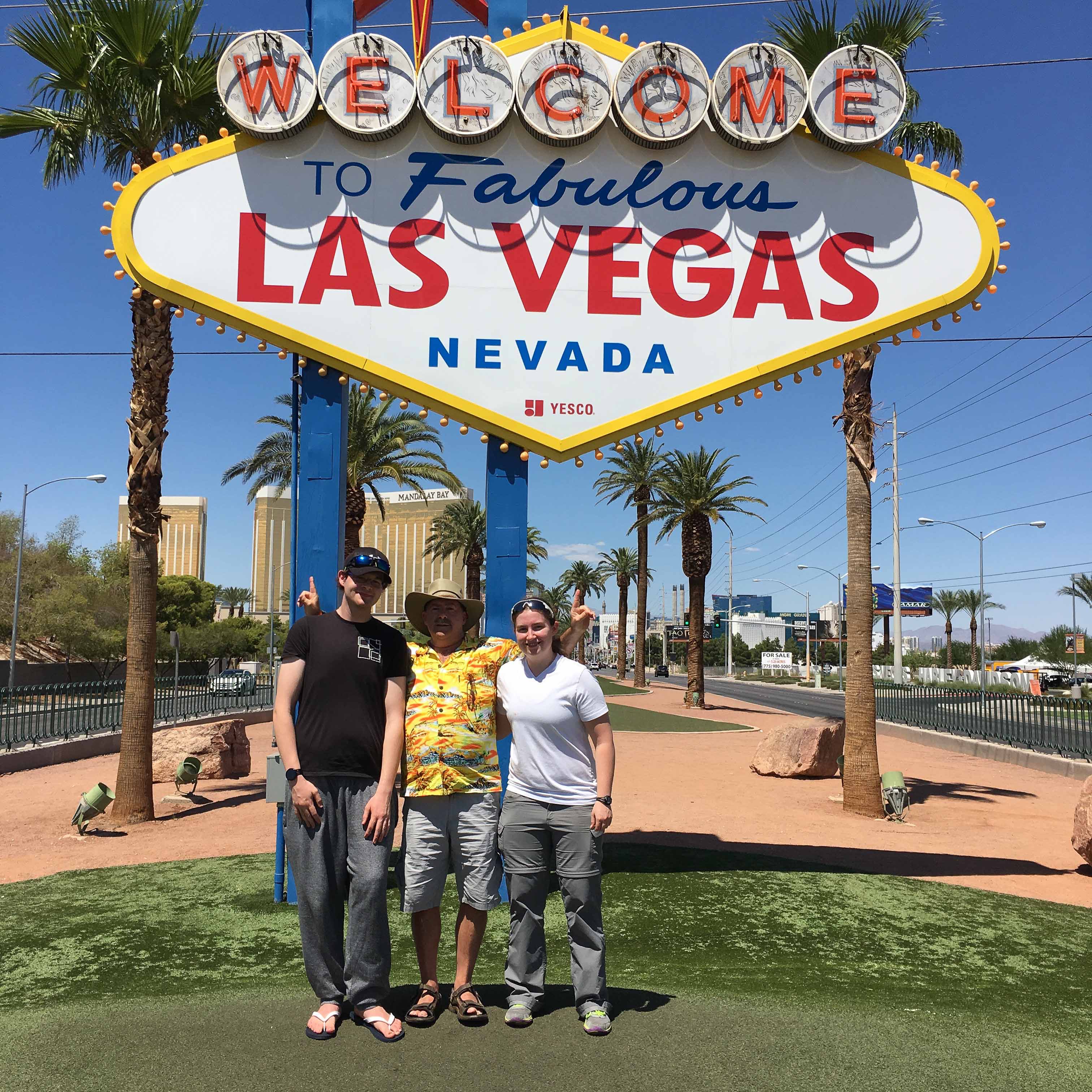 Donald, Greg, and Brittany in-front of the Las Vegas sign