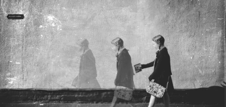 multiple exposure image simulating a girl walking right to left and fading away