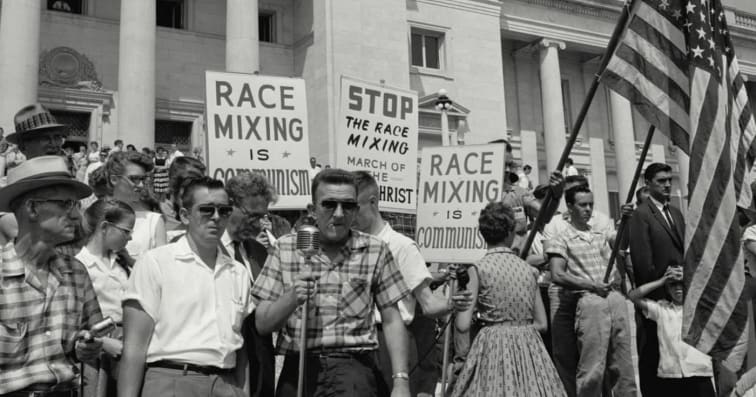 1960-era protestors protesting mixed-race marriages