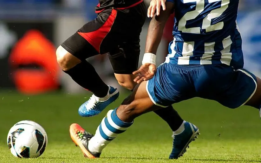 What is the difference between a holding midfielder and a defensive