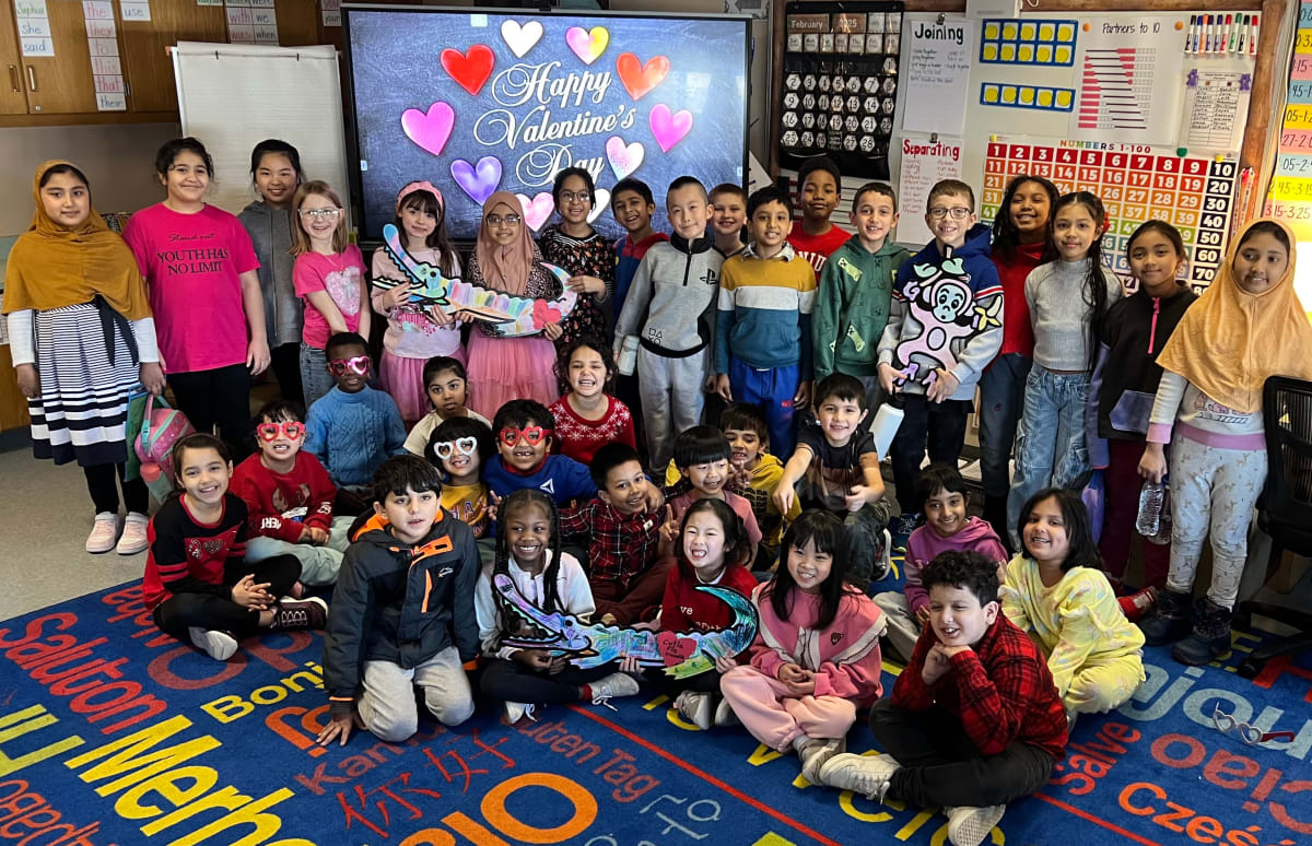 Parade photo of kids with a giant Doodle character