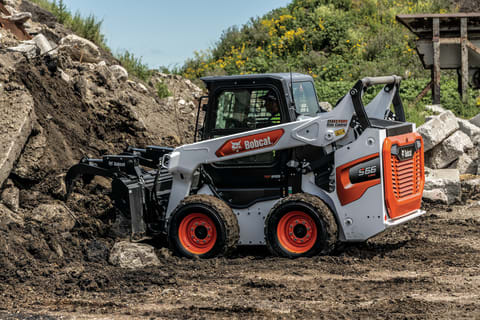 Bobcat skid steer in action