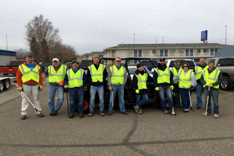 Bobcat Company Team Photo Before Volunteer Opportunity