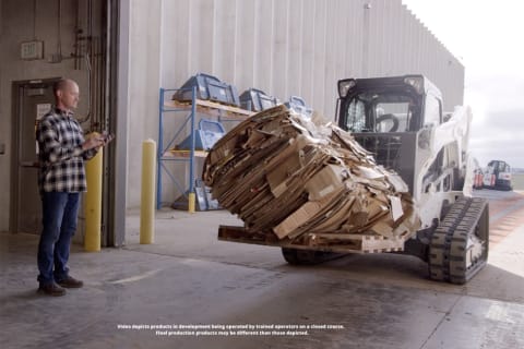 Bobcat operator uses the Bobcat MaxControl to control his compact track loader