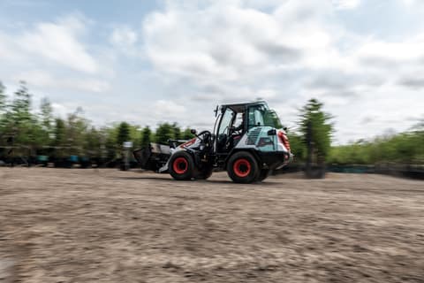 Bobcat L85 Compact Wheel Loader Drives Through Jobsite.