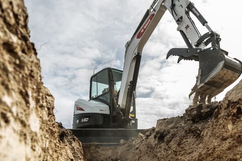 R2-Series E50 Compact Excavator Using Depth Check System To Trench