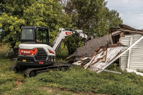 E60 Excavator Rips Down a Dilapidated Building  