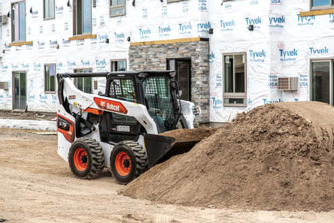 Skid-Steer Loader Grading With Loader Attachment