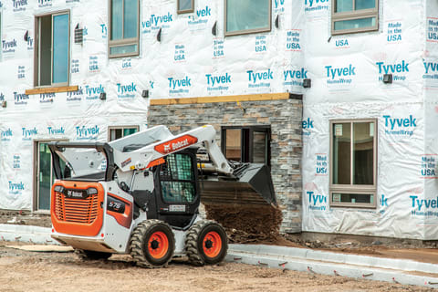 View Of A Bobcat Loader With Two Lift Arm Configuration Options on jobsite