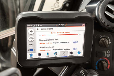 Touch Screen Displaying Oil Service Intervals Inside Bobcat Mini Excavator Cab