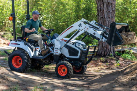 Ryan Nyquist shapes a BMX track with a Bobcat compact tractor.