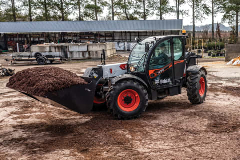 Bobcat TL723 Telehandler Hauling Mulch With Light Material Bucket