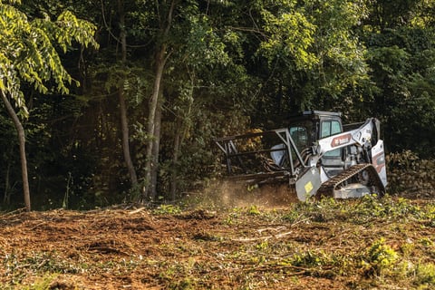 T86 Compact Track Loader with Drum Mulcher in use